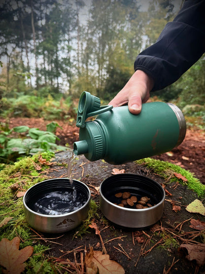 Stylish and practical 3-in-1 water bottle for dogs from Fido's Trails, featuring integrated bowls for hydration and snacks.