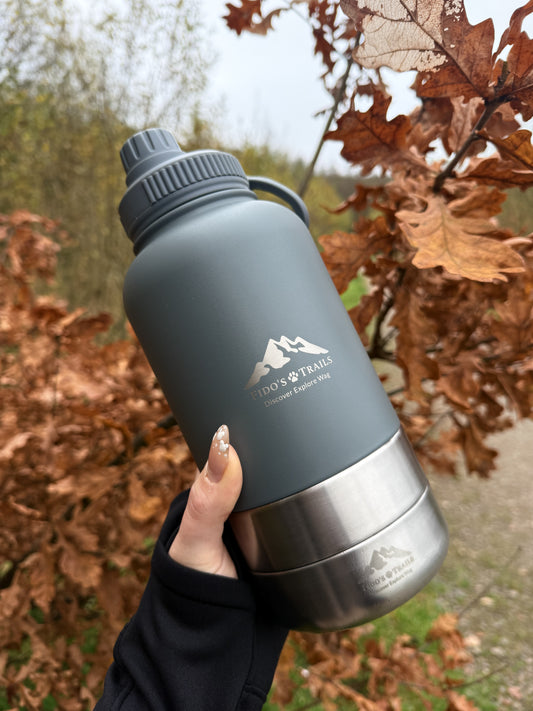 Portable 3-in-1 dog water bottle in Mountain Grey used outdoors during autumn walk