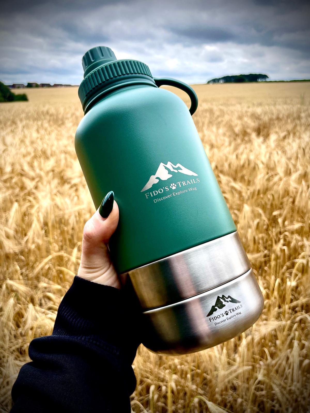 Portable 3-in-1 dog water bottle used outdoors during a countryside walk