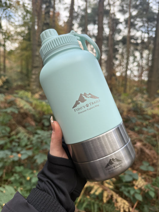 Stylish and practical 3-in-1 water bottle for dogs from Fido's Trails, featuring integrated bowls for hydration and snacks