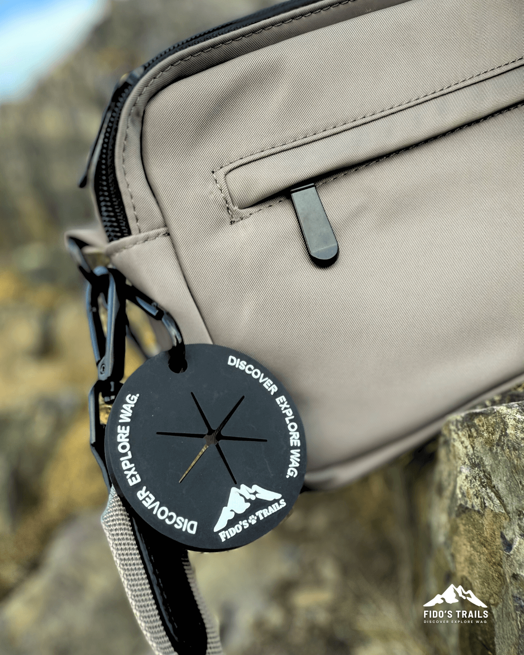 Close-up of black poo bag holder on mushroom dog walking bag – Fido’s Trails